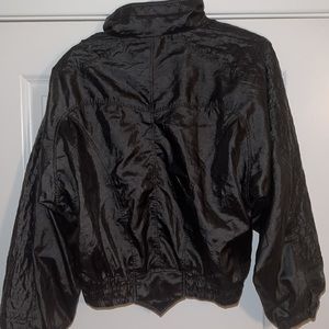 Vintage 90’s Black Adidas Windbreaker. Great condition, no flaws. Size Small.